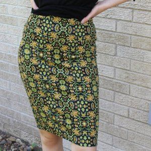 LuLaRoe orange/black/yellow patterned skirt small